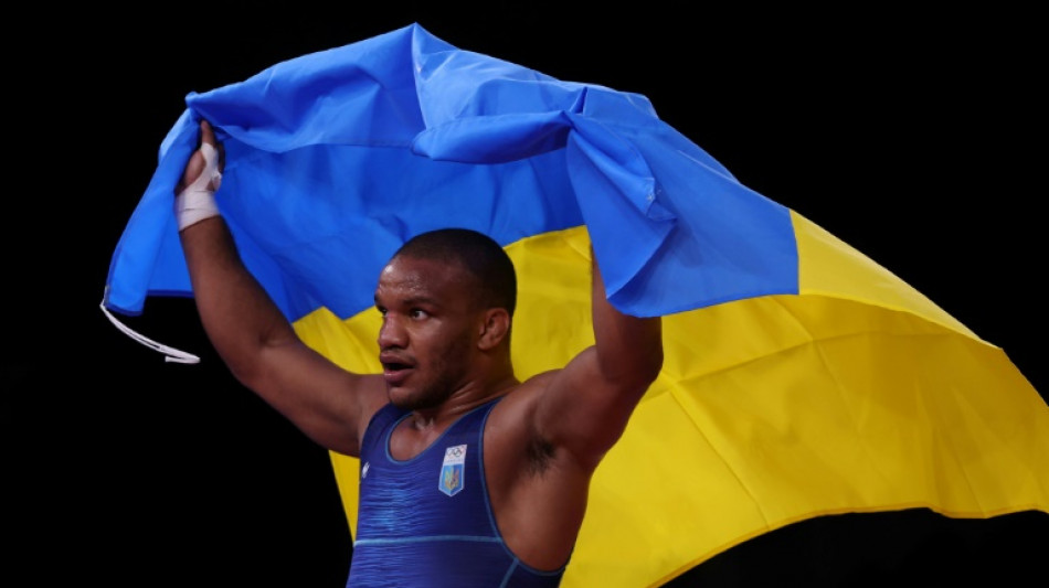 Beleniuk, &uacute;nico ouro ol&iacute;mpico ucraniano em T&oacute;quio, espera Jogos sem russos 