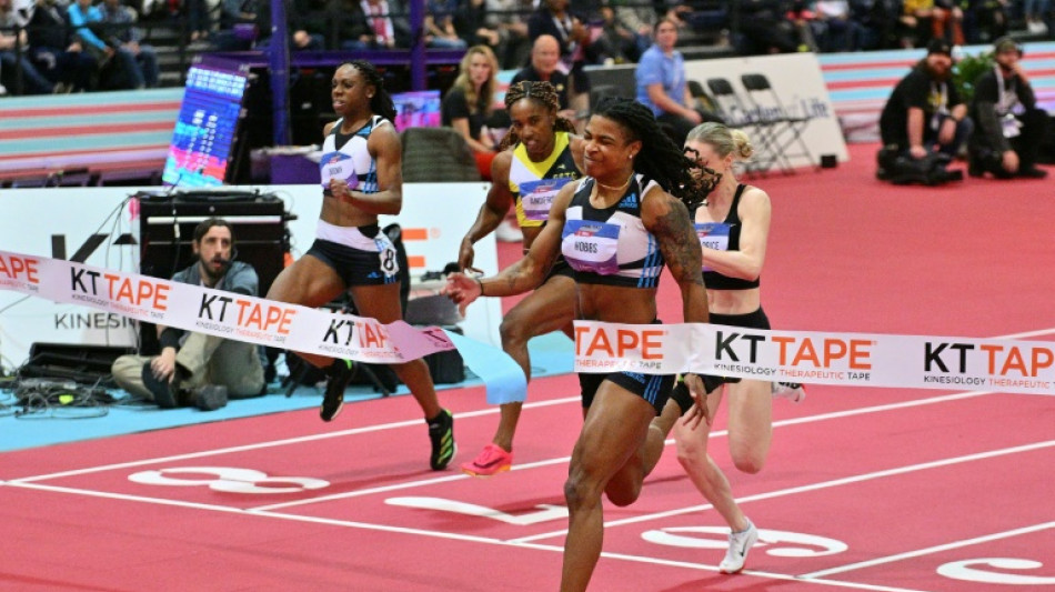Hobbs second-fastest ever in US 60m win as Lyles hurts hip