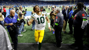 Love tames the Lions in Packers upset win