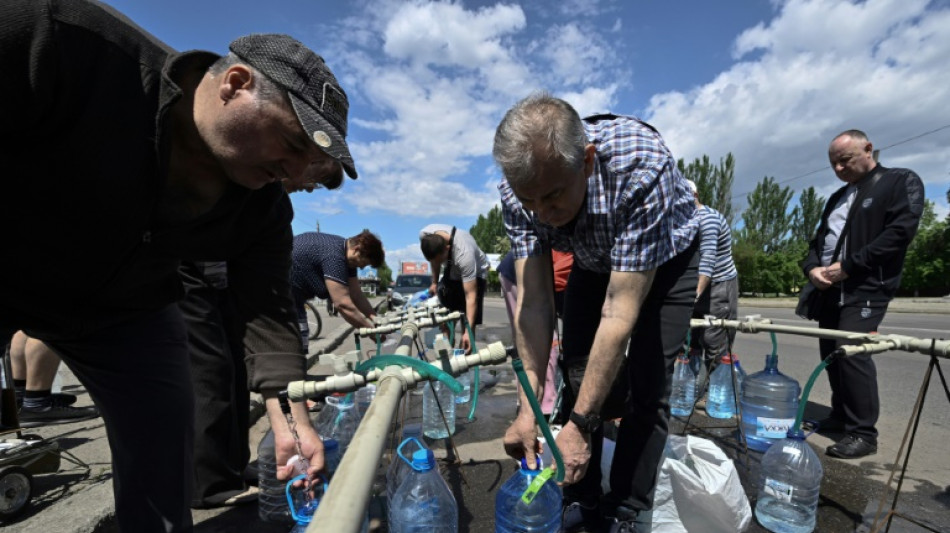 A Mykola&iuml;v, les habitants face aux p&eacute;nuries d'eau, &eacute;ni&egrave;mes difficult&eacute;s d'une vie boulevers&eacute;e