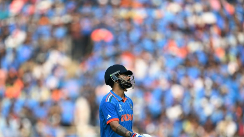 Kohli out for 54 in World Cup final