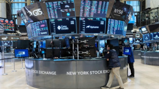 Wall Street termine dans le rouge apr&egrave;s le ton ferme de la Fed