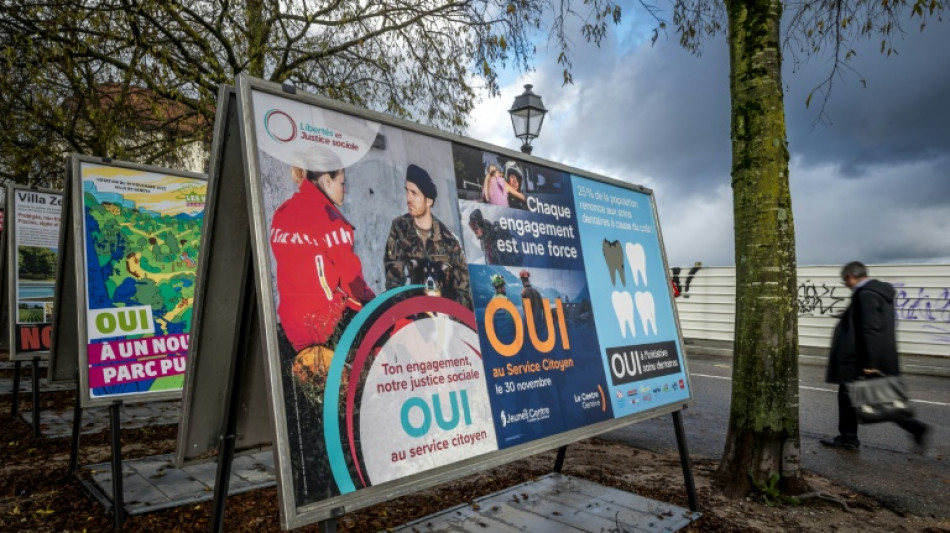 Swiss reject compulsory civic duty, climate tax for super-rich