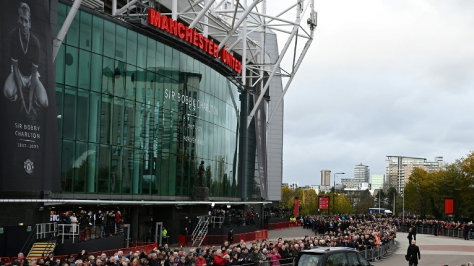 Thousands line Manchester streets to bid final farewell to Bobby Charlton