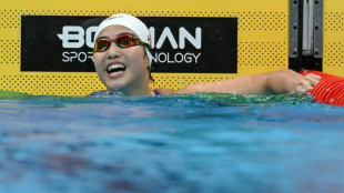 Swimming prodigy Yu, 13, says 'interviews way harder than racing'