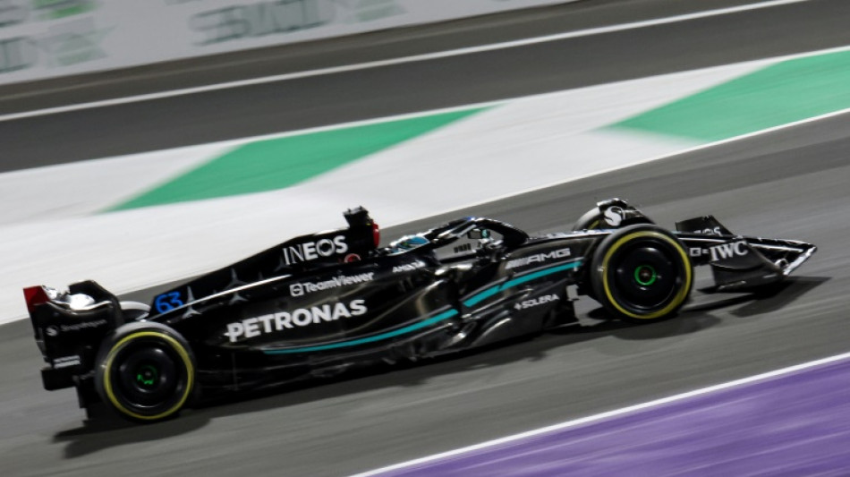 Russell consoles Alonso but happy to take points and prize