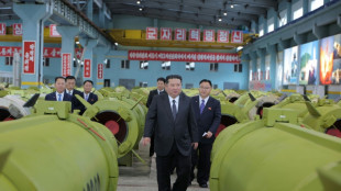 North Korea's Kim orders factories to make more missiles in 2026