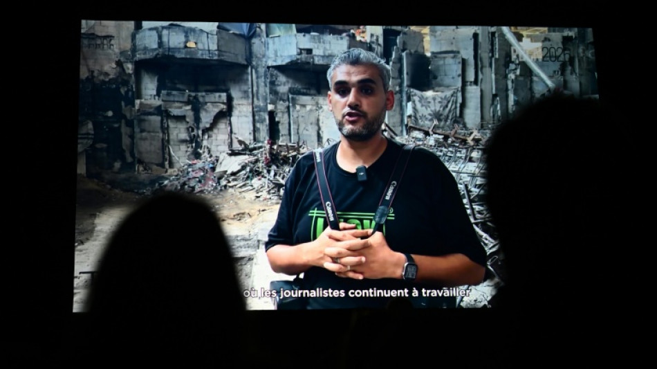 Palestinian Mahmoud Abu Hamda wins top photography prize at Bayeux