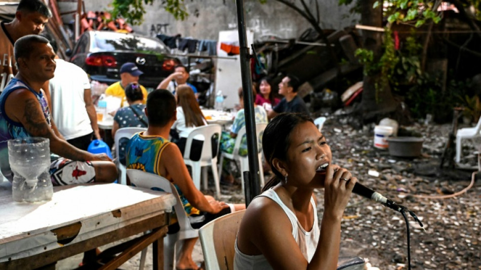 'We love singing': Filipinos find joy in karaoke