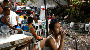 'We love singing': Filipinos find joy in karaoke