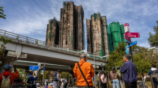 Hong Kong begins mourning period after fire kills at least 128