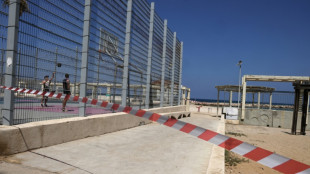 Israeli beachgoers try to brush off Hezbollah threat
