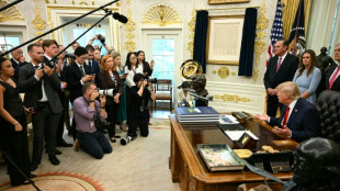 US networks halt Trump coverage in revolt over White House ban