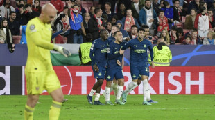 Sevilla crash out of Champions League after PSV comeback
