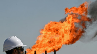 Oil slumps after hitting peak, US indices reach new records