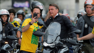 A pie y en moto, Lula y Bolsonaro cierran campa&ntilde;a en Brasil
