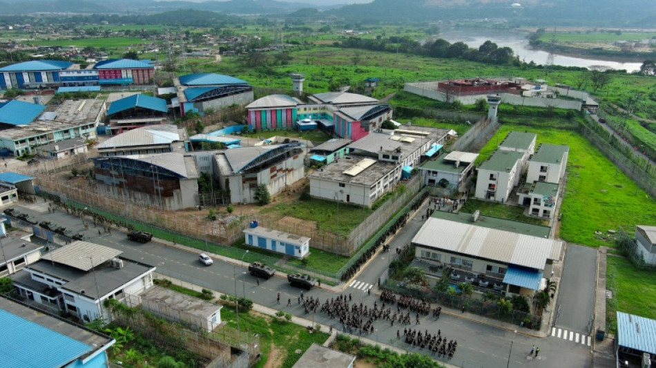 Ecuador police hold two for prosecutor's murder, soldiers raid prison