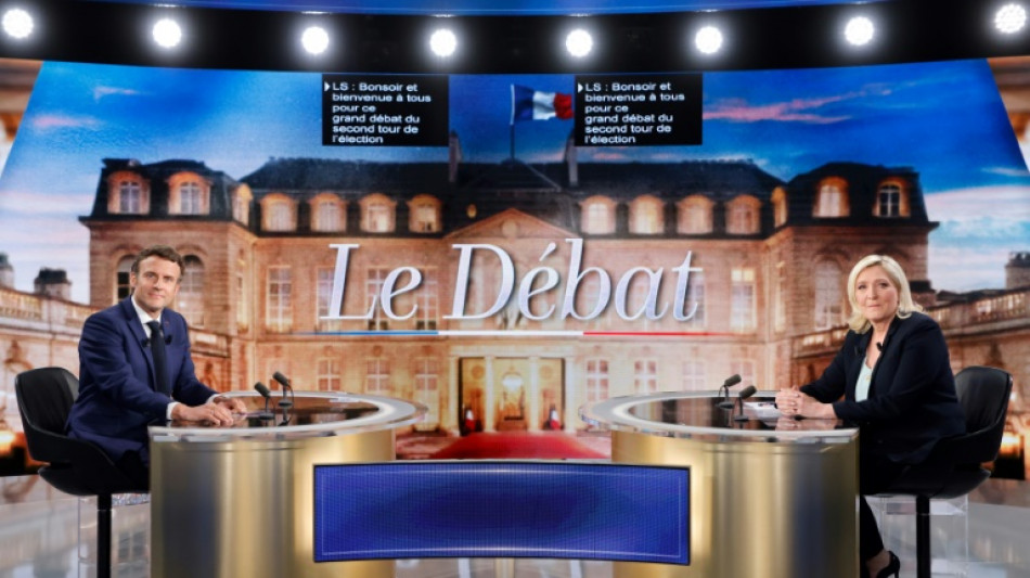 Pr&eacute;sidentielle: Macron et Le Pen sur le terrain apr&egrave;s un d&eacute;bat muscl&eacute;